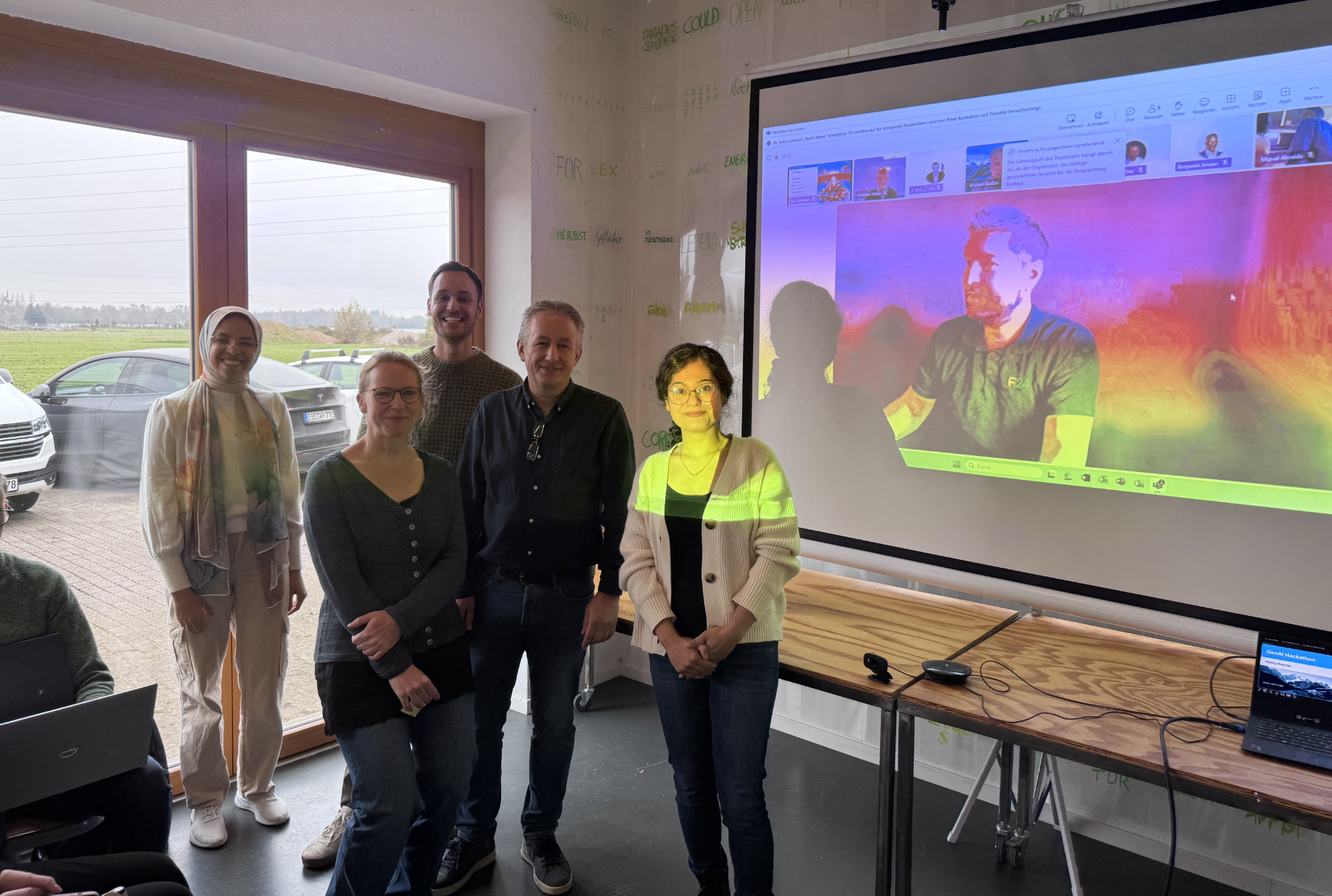 The F24 AI hackathon team standing together after the internal product demo.